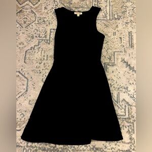Little black dress with mesh on chest and bottom of dress, very flattering on